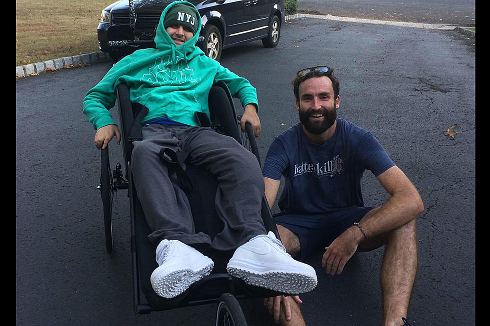 Paralyzed Monroe HS alum & teacher prep as NYC marathon duo