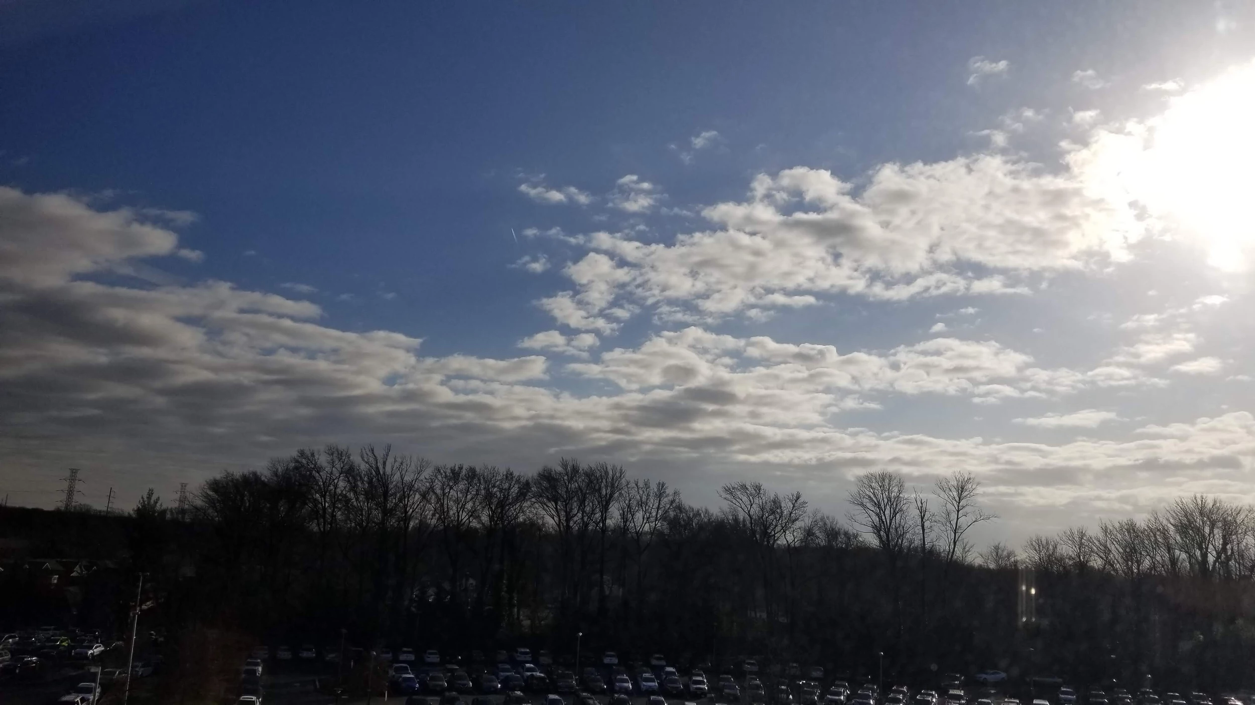 Tuesday Early Afternoon Update: Pesky clouds, flurries, sprinkles