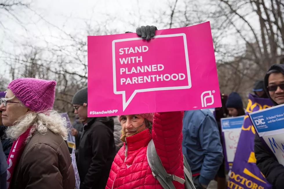 Murphy signs law giving millions more to Planned Parenthood