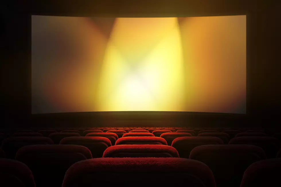 Movie theater with projection screen
