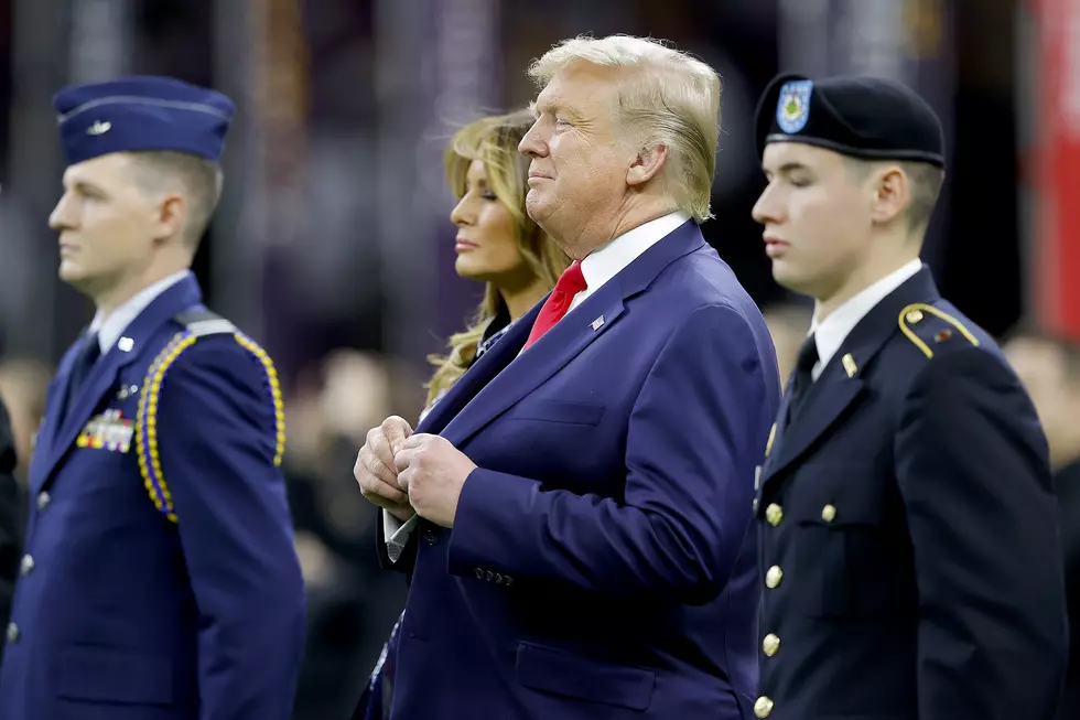 Trump goofs off during National Anthem