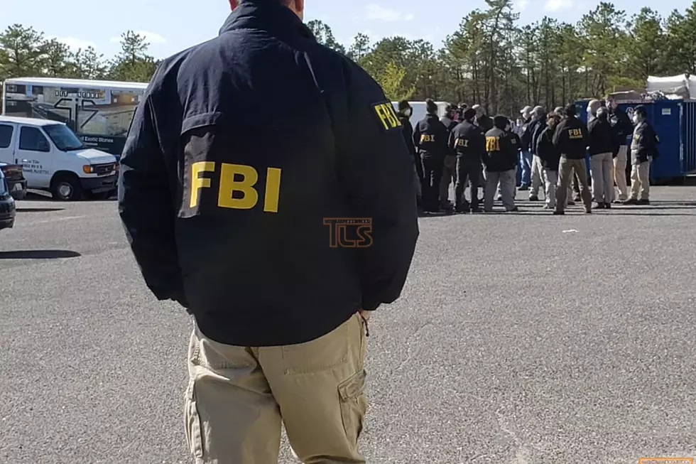 FBI agents remove boxes labeled &#8216;respirators&#8217; from Lakewood warehouse