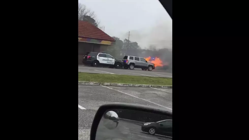 WATCH: Dramatic car fire video and the cop who saved the day