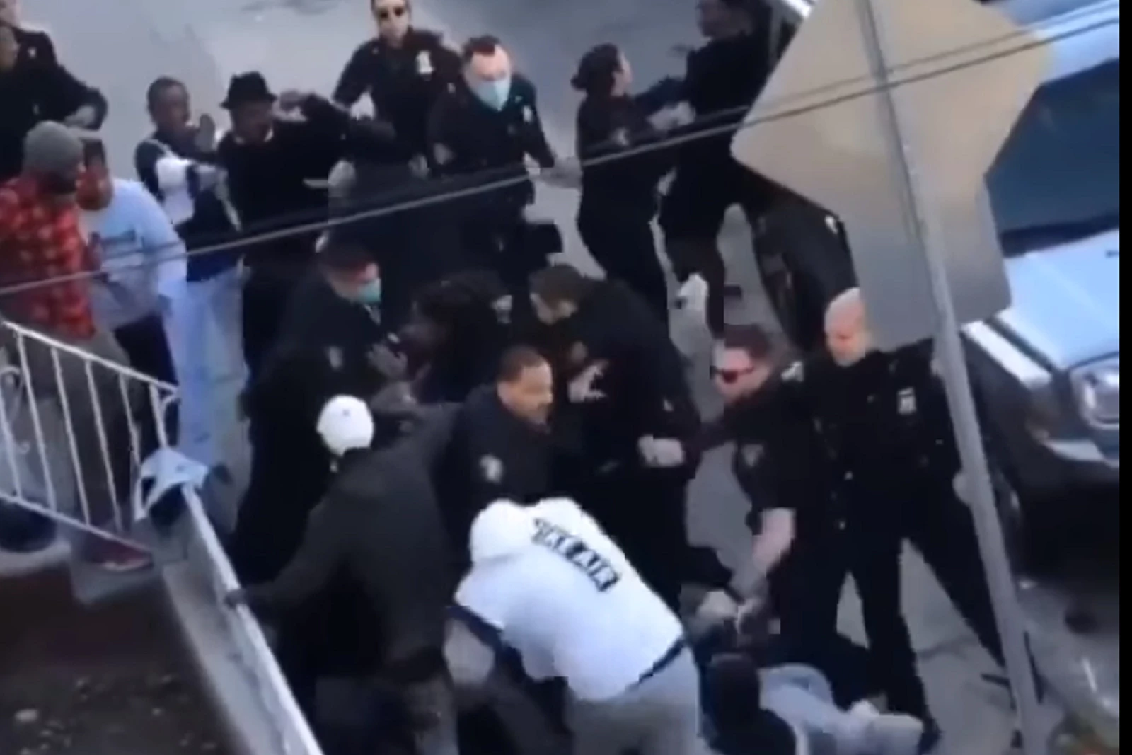 Jersey City cops with batons break up major street brawl — VIDEO