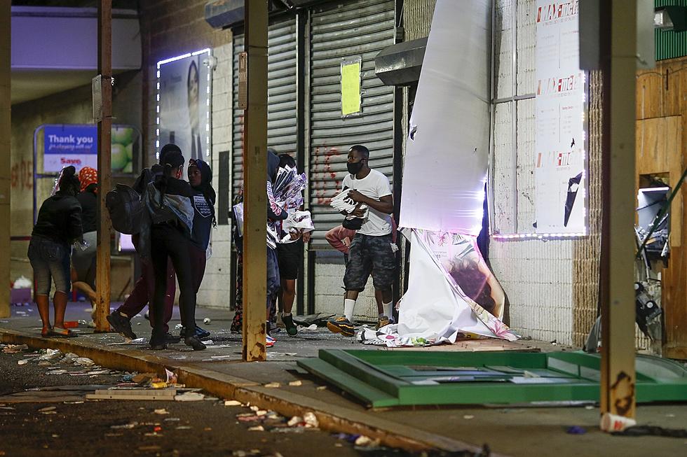 Tear gas used on Philadelphia crowds as destruction continues