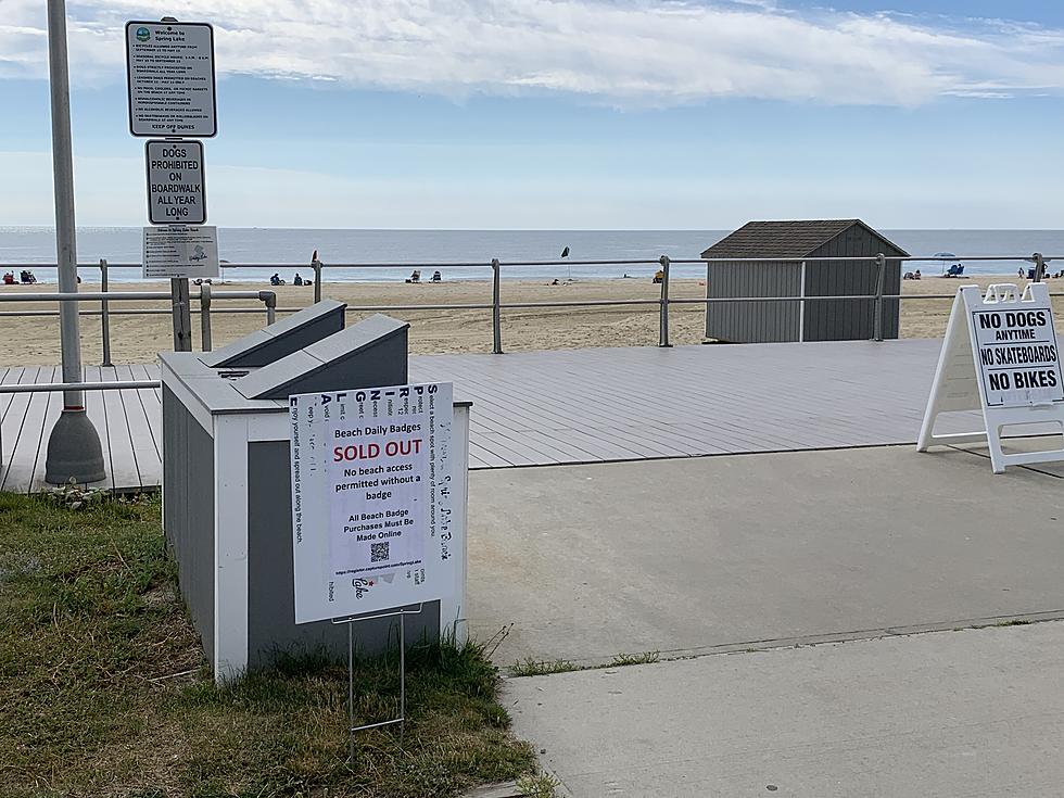 Why were Spring Lake beach badges sold out with beaches empty?