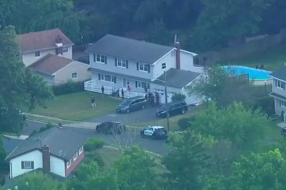 Screams heard before East Brunswick family found dead in pool