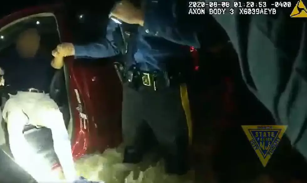 Watch State Troopers pull man from car in flash flood