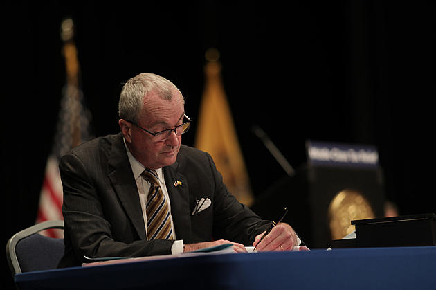 NJ budget signed, but immigrant funding remains at issue