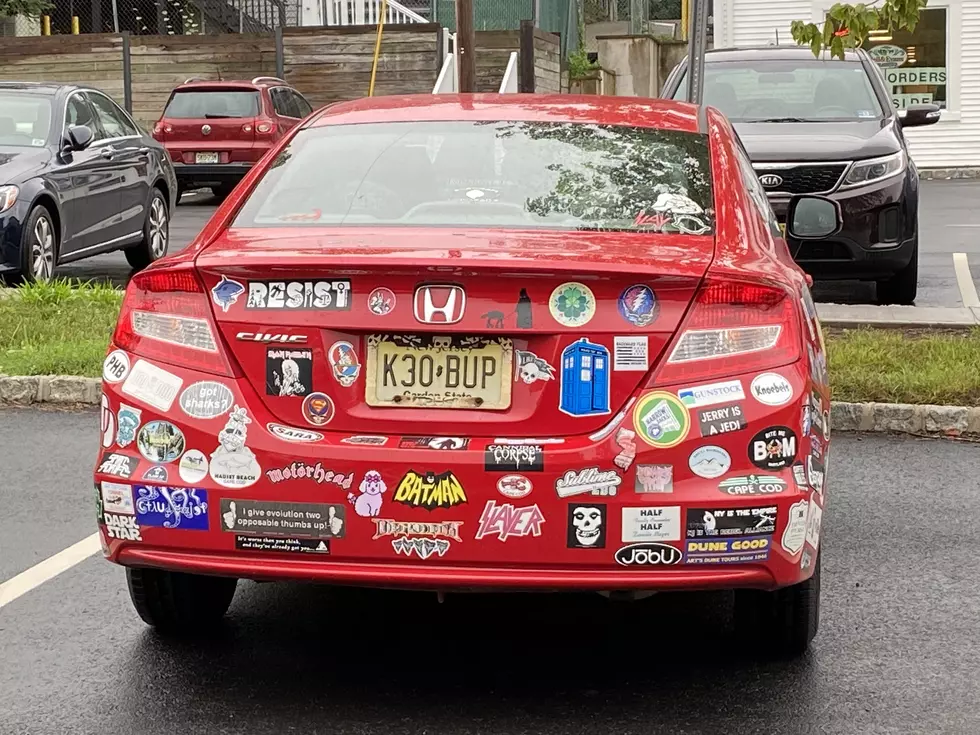 Does this guy have enough bumper stickers?