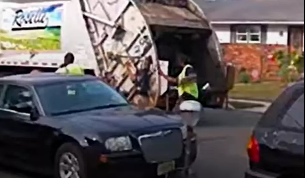 Garbage collectors dancing in street caught on camera