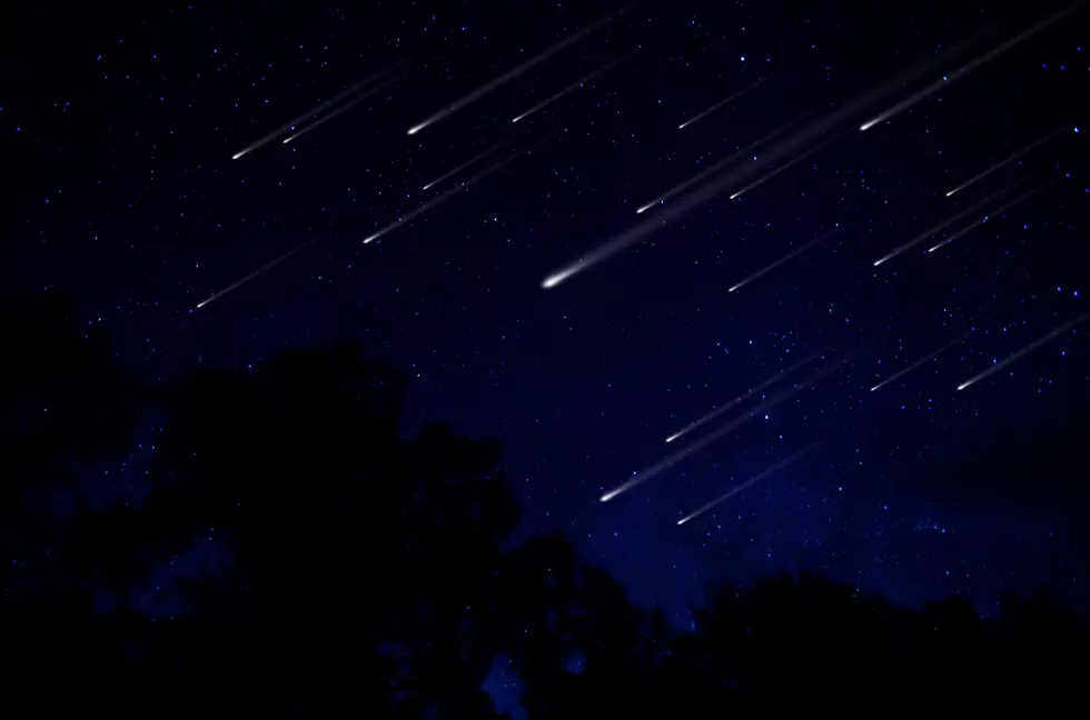 Meteor shower in night sky illustration