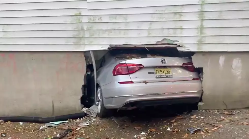 Car crashes right into NJ basement