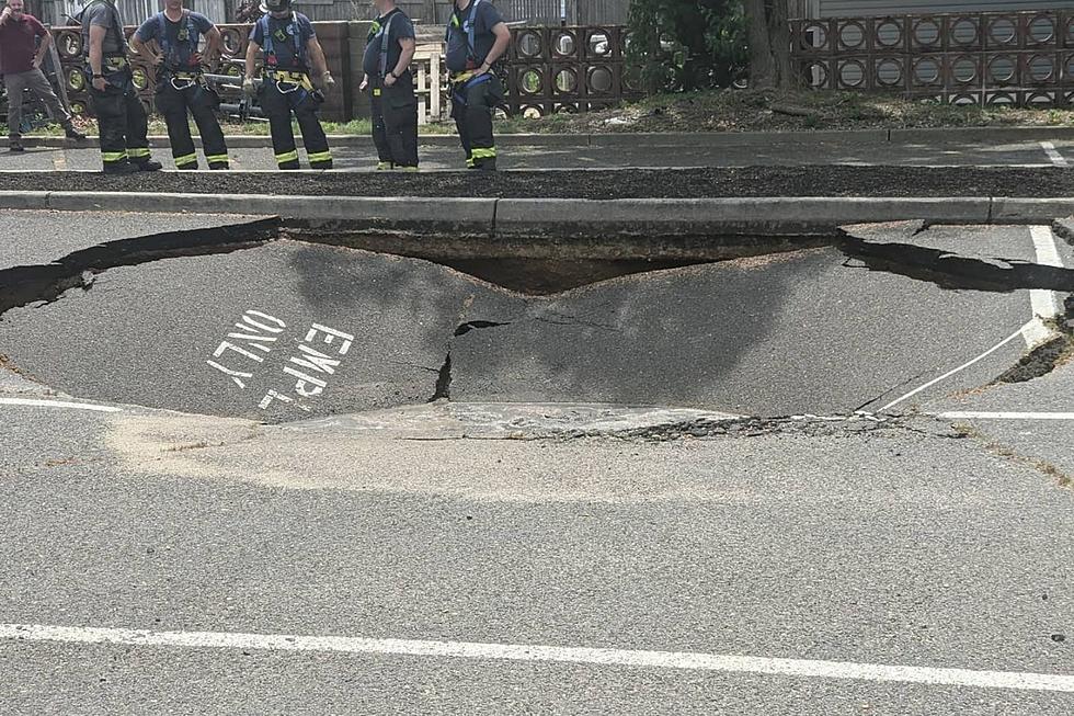 Sink hole opens up in Wall, NJ shopping plaza parking lot