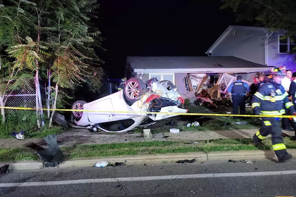 Car after striking Lakewood house