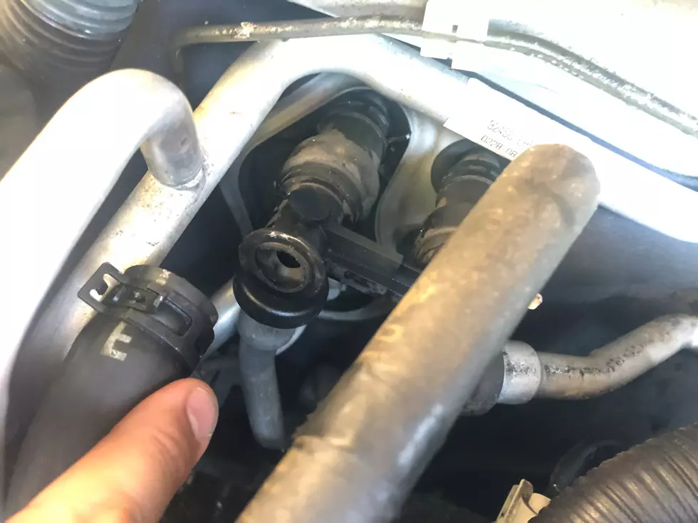 Broken coolant hose in car