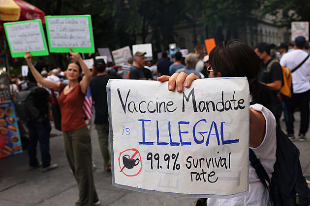 People Gather At City Hall To Protest Against Vaccine Mandates In New York City