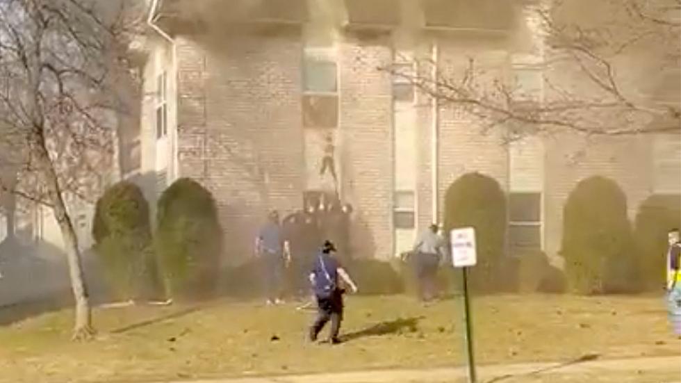 WATCH: South Brunswick, NJ police catch kid, dad jumping from fire