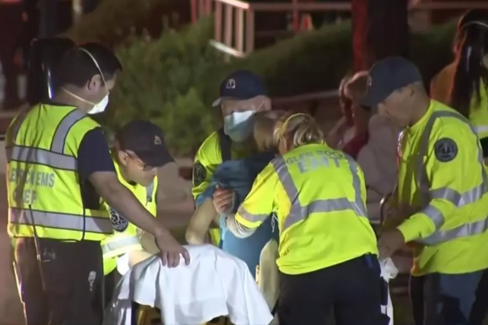 Emergency responders help seniors at the Ridgecrest Apartments Saturday evening, June 11, 2022. (CBS 2)