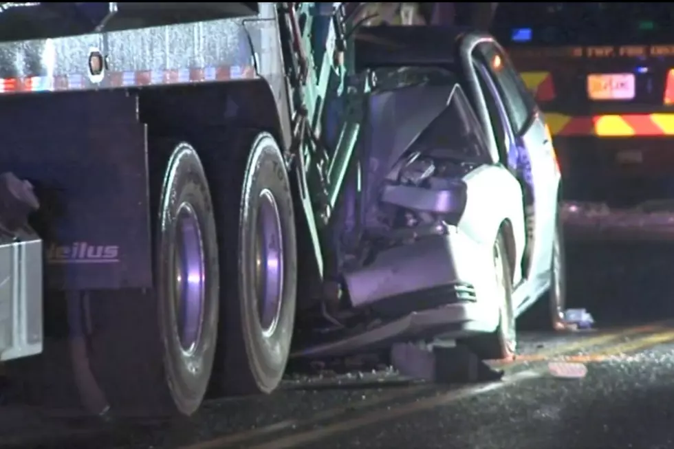 NJ driver dies after crashing into garbage truck, almost hitting workers