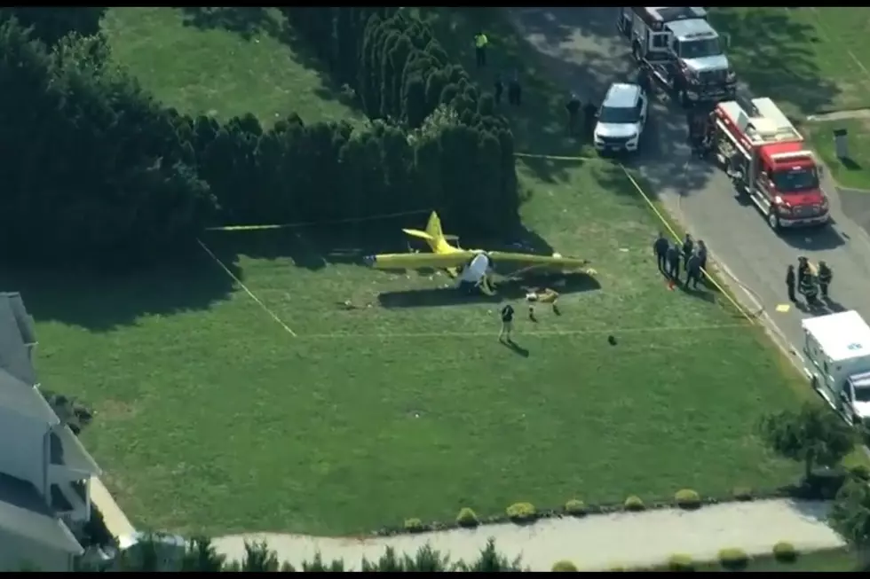 Plane crashes in South NJ yard, leaving 2 people dead