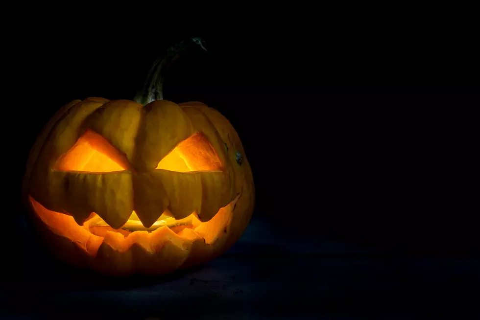 Halloween pumpkin head jack in darkness night with copy space