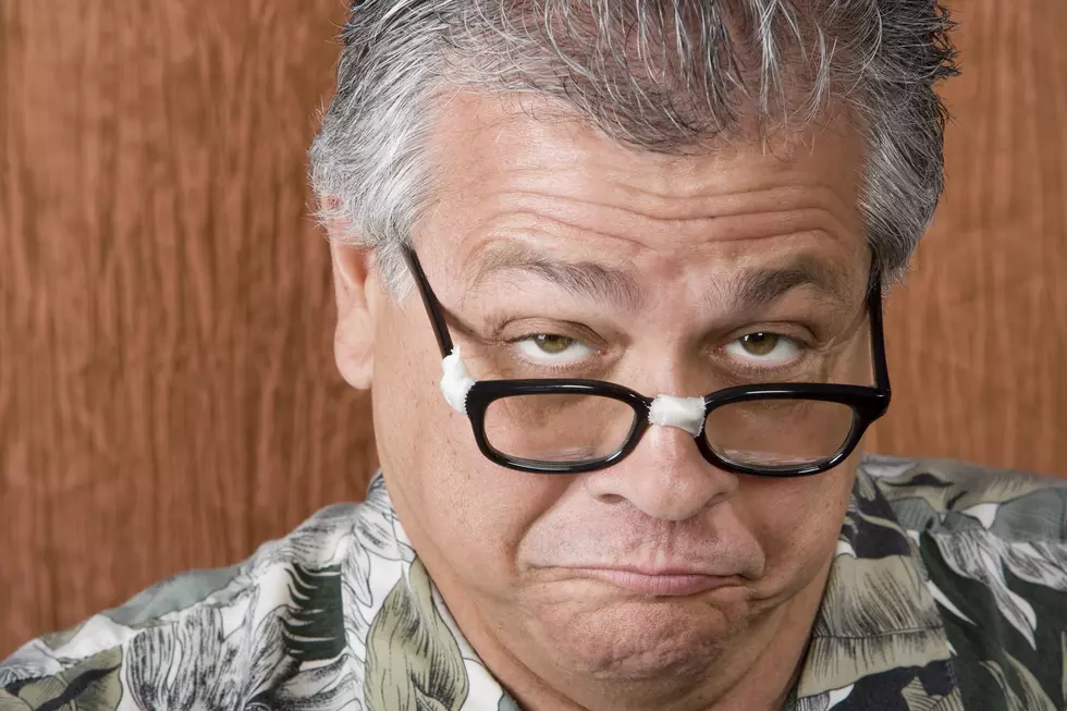 Silly Mexican-Italian Man with Taped Corrective Glasses