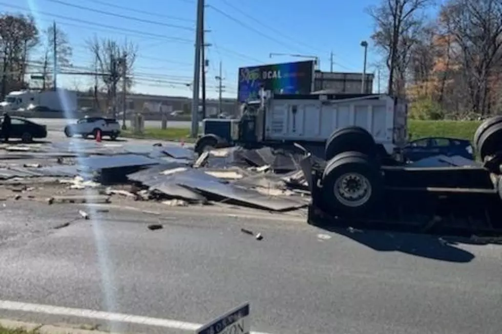 Load of plywood spilled by an overturned truck on Route 1 at Promenade Boulevard in South Brunswick 11/9/22