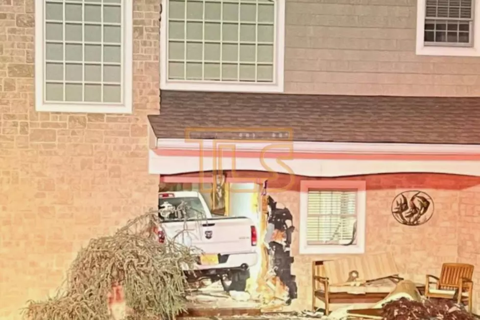 NJ man charged with DWI crashes pickup through front door of home