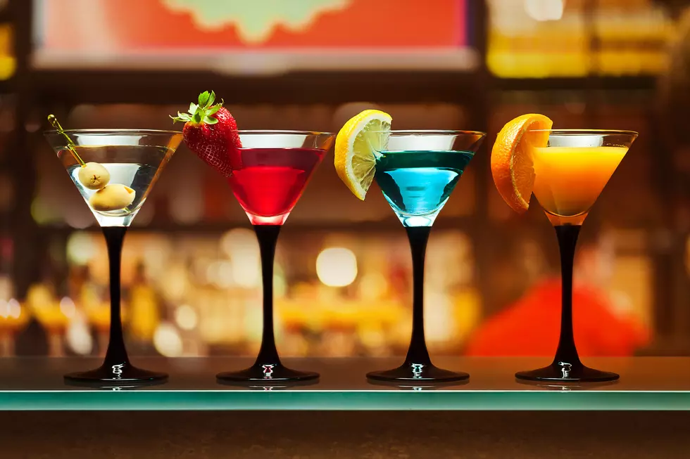 Different cocktails or longdrinks garnished with fruits