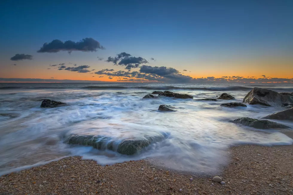 Ocean waves rushing over rocks
