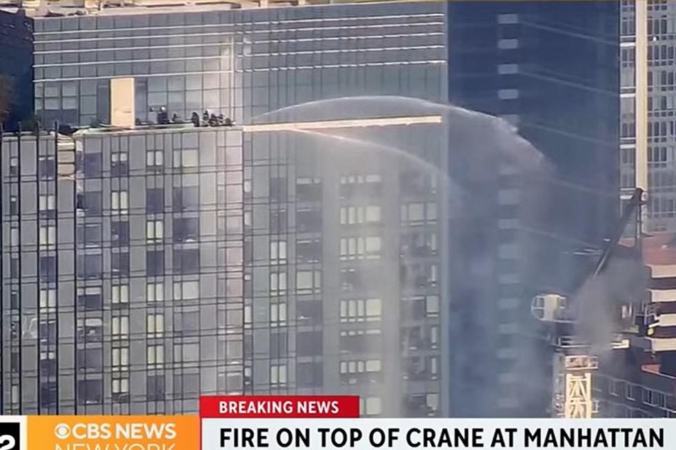 Dramatic video: NYC construction crane crashes into building