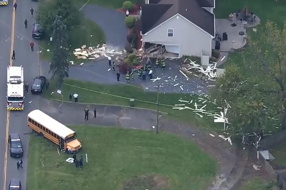 Edison, NJ school bus carrying students crashes through corner of house