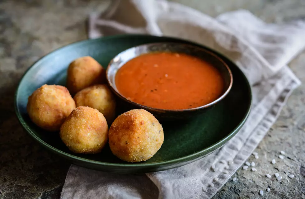 Arancini - traditional deep fried rice balls with meat and cheese