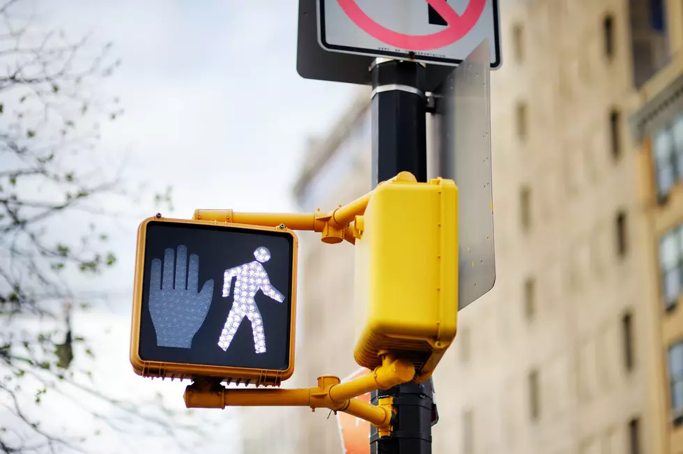 Don't walk New York traffic sign on blurred background