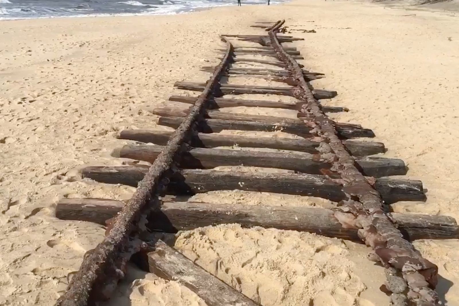 Storms reveal 'ghost railroad tracks' at Cape May, NJ beach