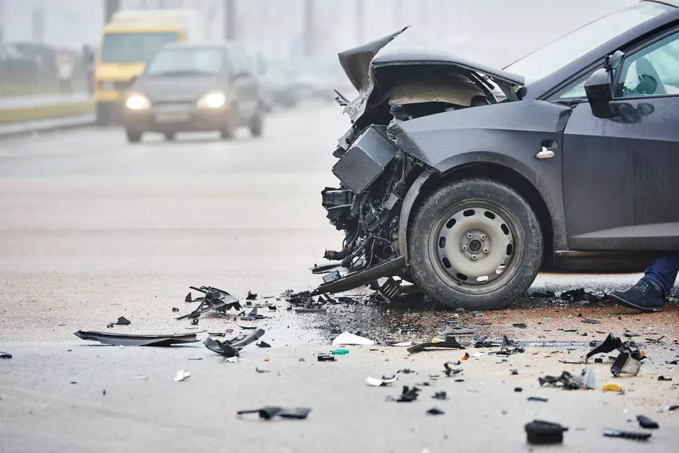 car crash accident on street, damaged automobiles after collision in city