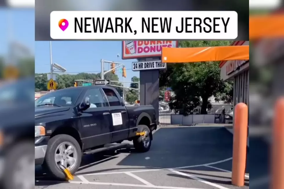 NJ viral video: Man drives away with tire boots still on his truck