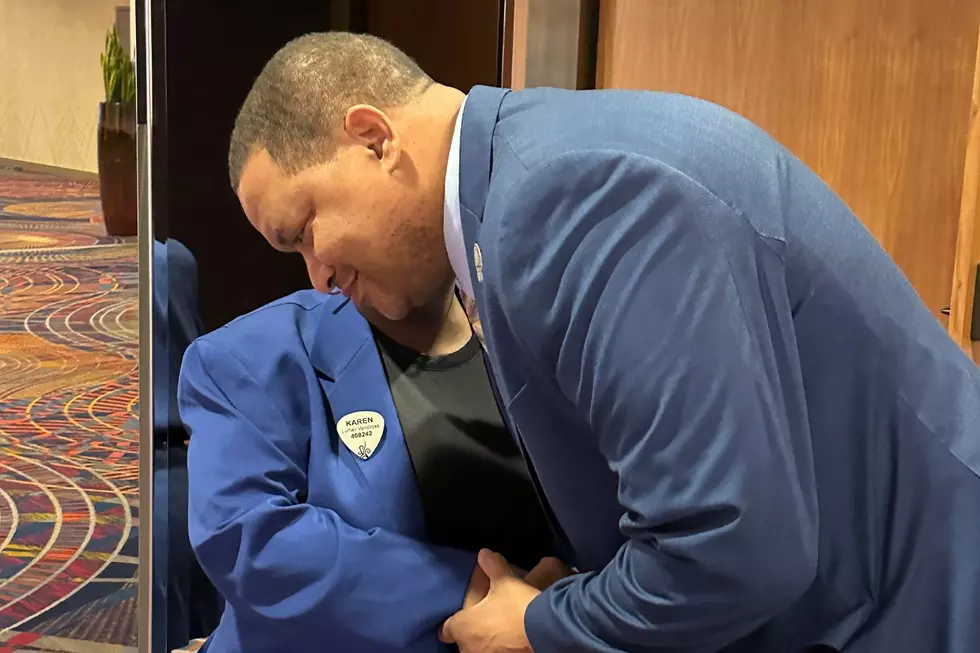 Atlantic City Mayor Marty Small talks to a attendant in a conference room in Atlantic City