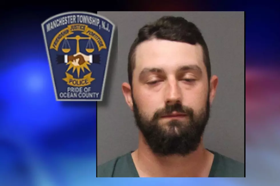 NJ man charged after shooting gun from vehicle