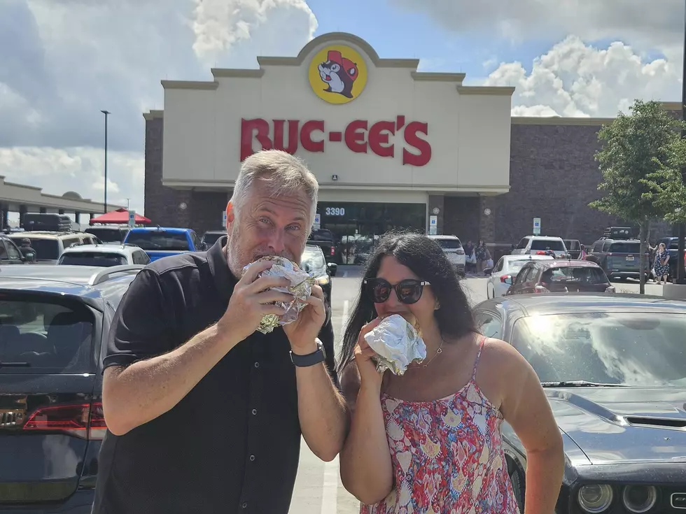 Eating our brisket and pulled pork sandwiches from Buc-ee's (Jen Ursillo)