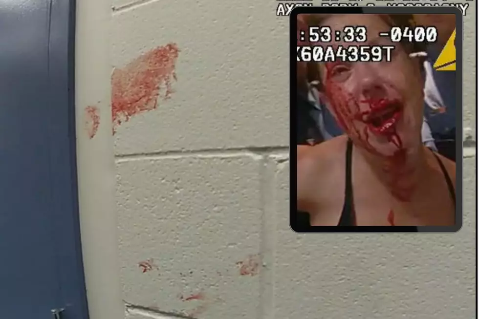 NJ state trooper avoids jail for punching handcuffed woman