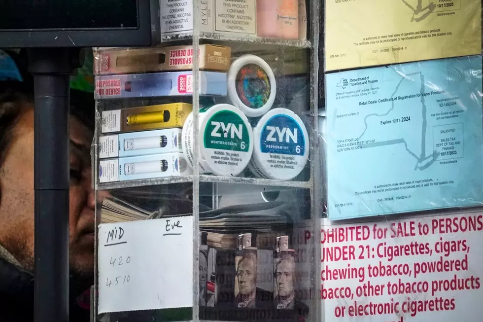 Containers of Zyn, a Phillip Morris smokeless nicotine pouch, are stacked for sale at a newsstand Friday, Feb. 23, 2024, in New York. (AP Photo/Bebeto Matthews)