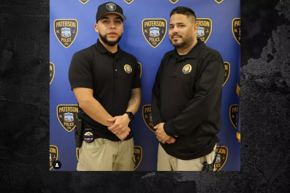 Paterson officers Valentin Torres (L), Detective Garcia