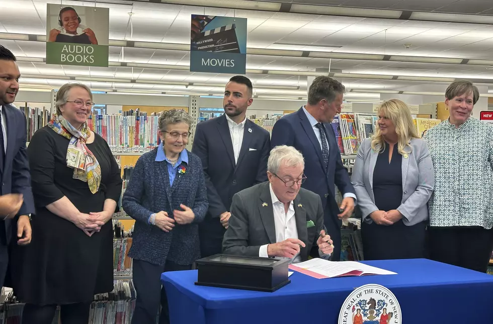 New Jersey Gov. Phil Murphy at the Princeton Public Library on Monday, Dec. 9, 2024, signs legislation aimed at barring public libraries and schools from banning books. AP photo/Mike Catalini Get Outlook for iOS