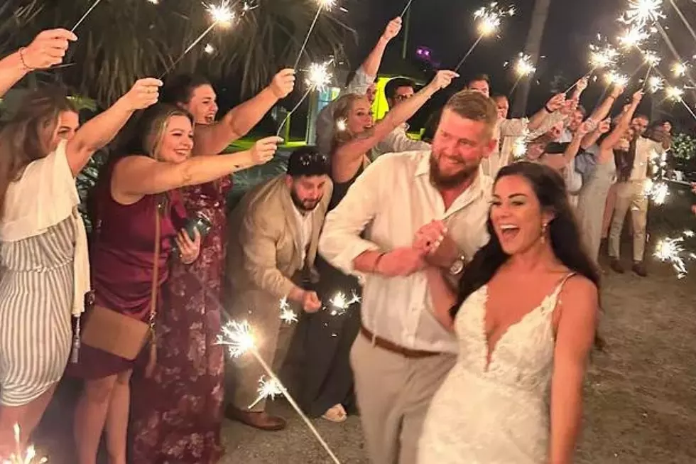 Samantha Miller and husband Aric Hutchinson at their wedding