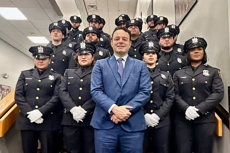 Mayor Andre Sayegh stands with new Paterson police hires. (Andre Sayegh via Facebook)