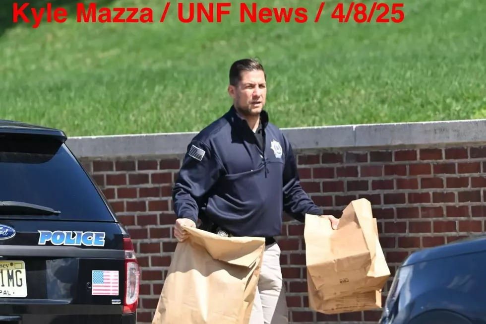 Officer removes evidence from Fort Lee High School after a stabbing 4/8/25