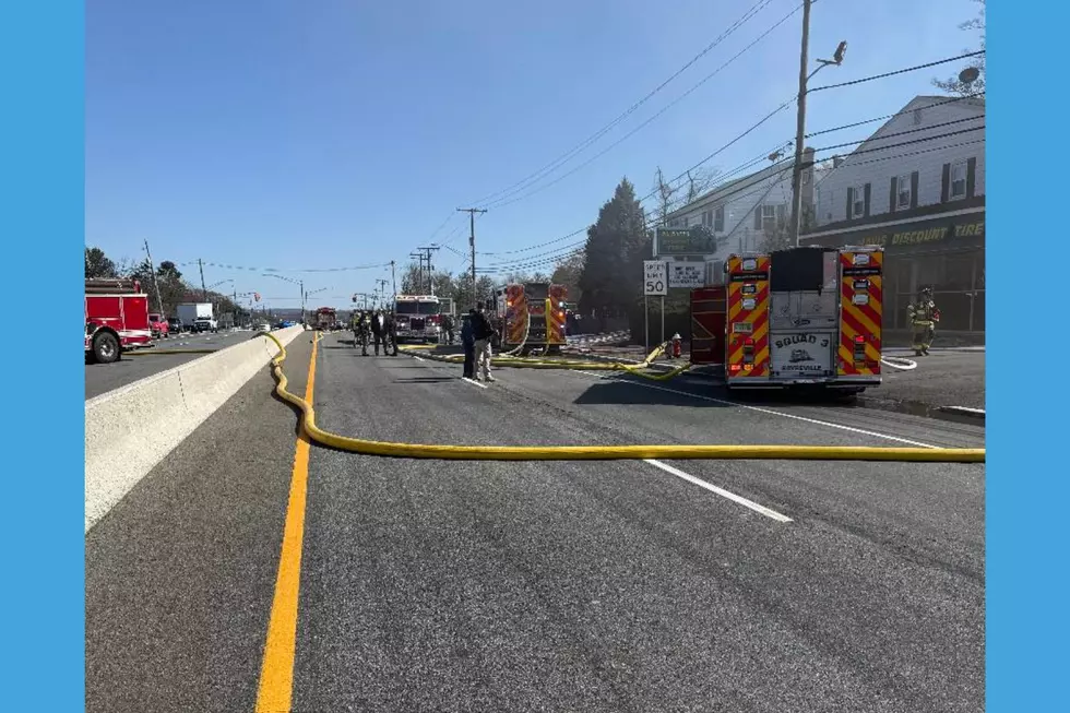 A fire collapses the roof at Mavis Tire Shop in Sayreville (Sayreville PD via Facebook/Canva)