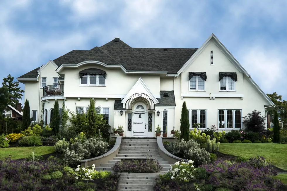 Exterior of white stucco luxury house